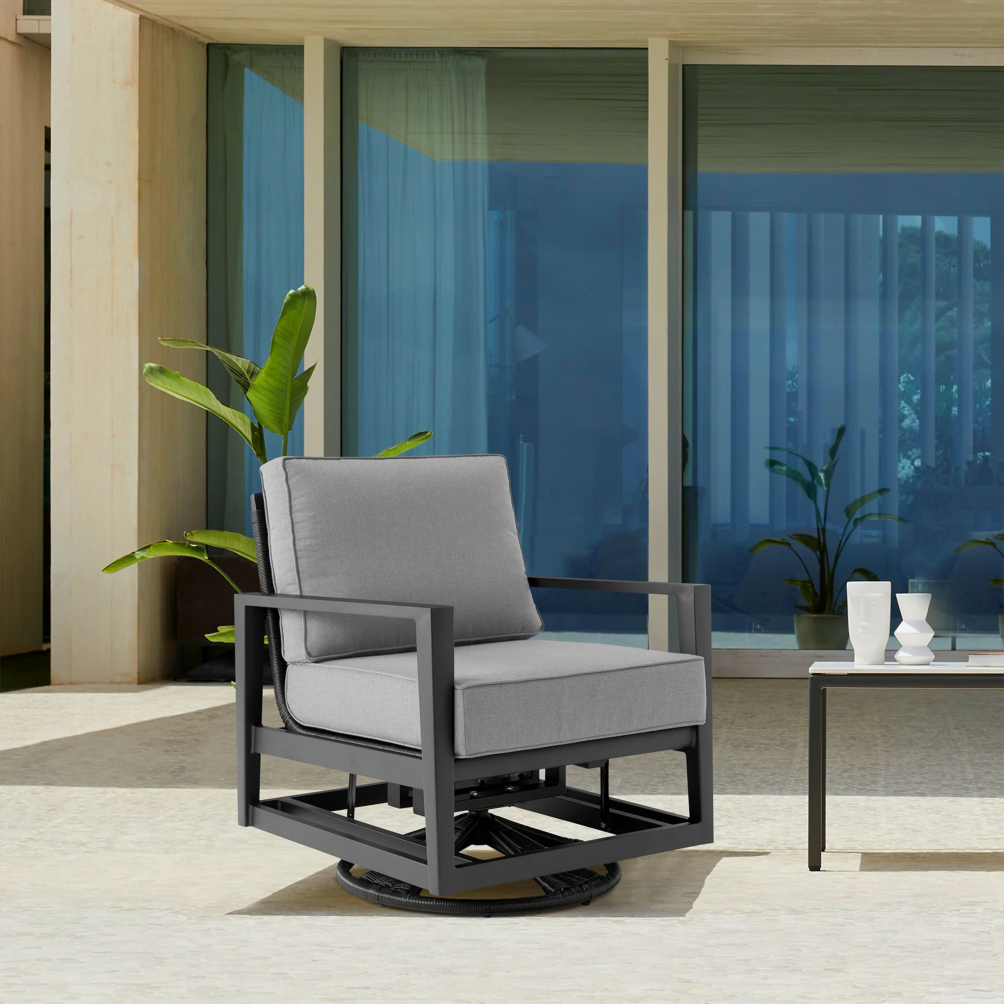Grand Black Aluminum Outdoor Swivel Glider Chair with Dark Gray Cushions By Armen Living