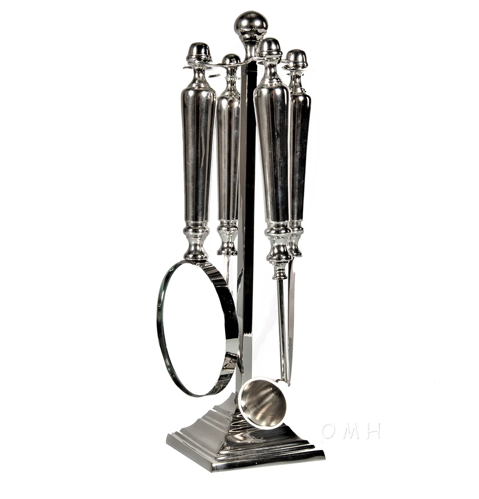 Magnifying glassLetter openerBottle openerand a Candle snuffer Functional Decor By Homeroots